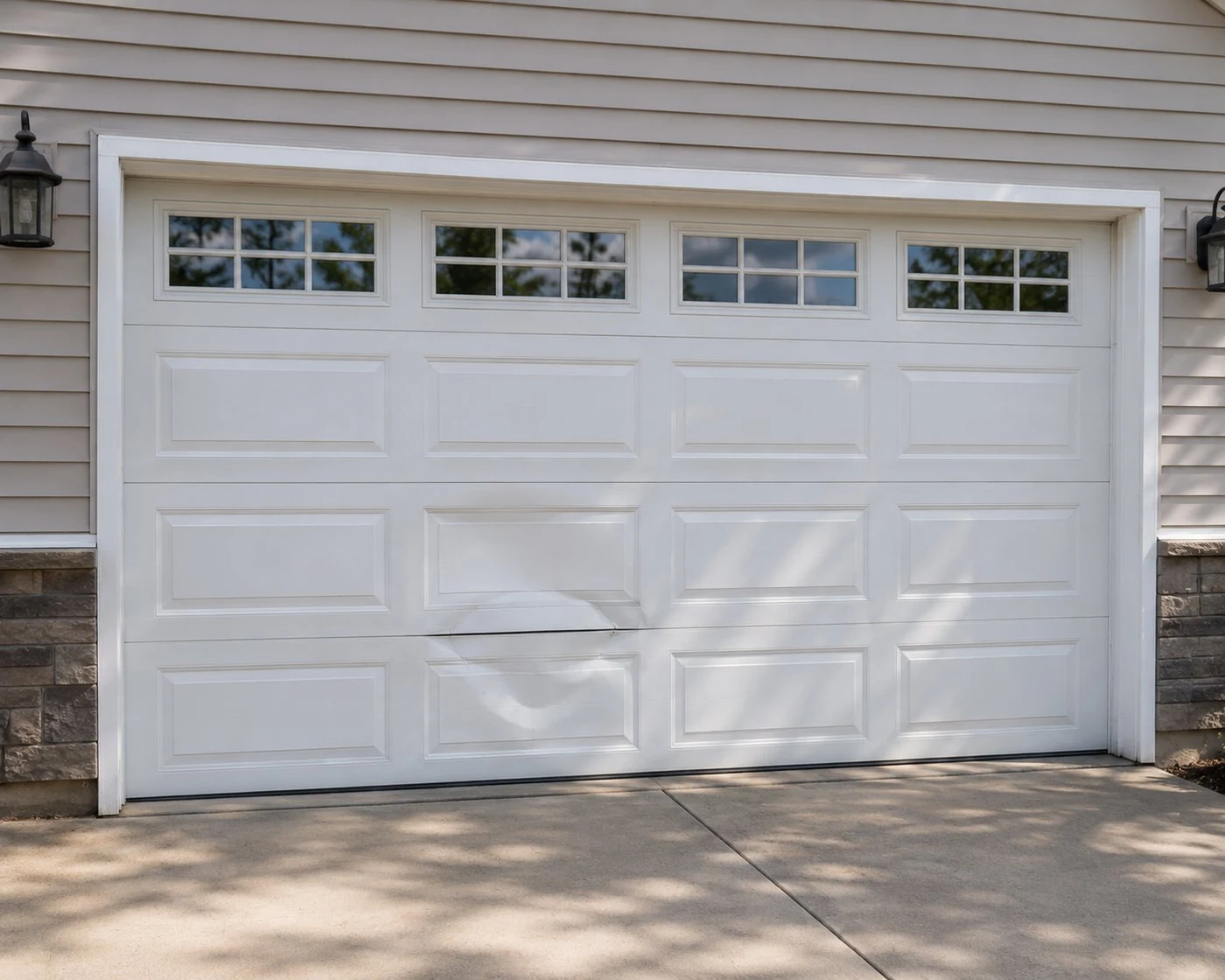Damaged garage door panel Columbus Ohio - dented panel needing replacement